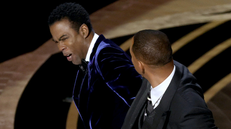 Will Smith appears to slap Chris Rock onstage during the 94th Annual Academy Awards