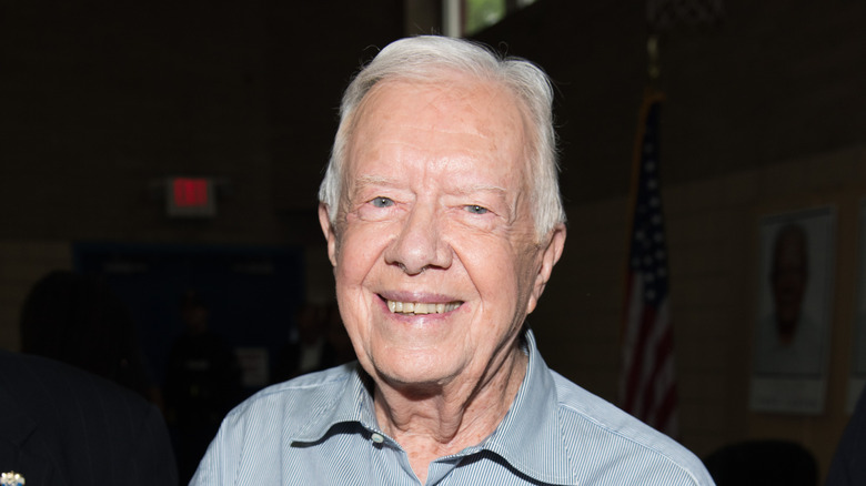 Jimmy Carter poses at the Bookends Bookstore