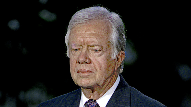 Jimmy Carter sits on the North Lawn of the White House for an interview