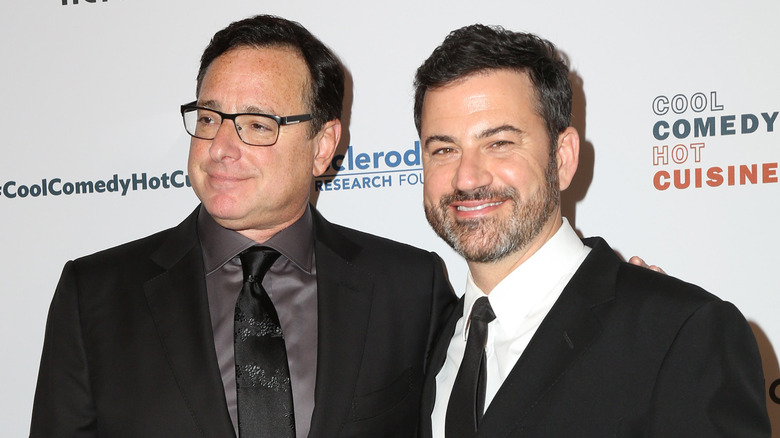 Jimmy Kimmel posing for a photo with Bob Saget 