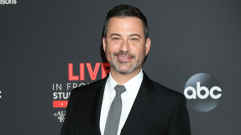 Jimmy Kimmel smiling on the red carpet