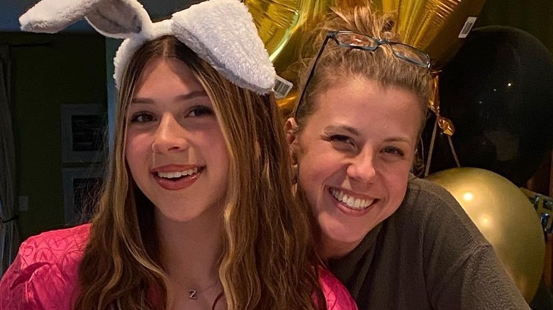 Jodie Sweetin smiling with daughter Zoie