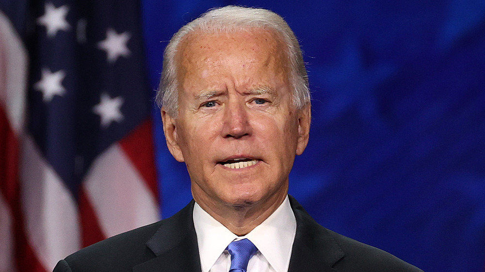 Joe Biden looks speaking at a conference