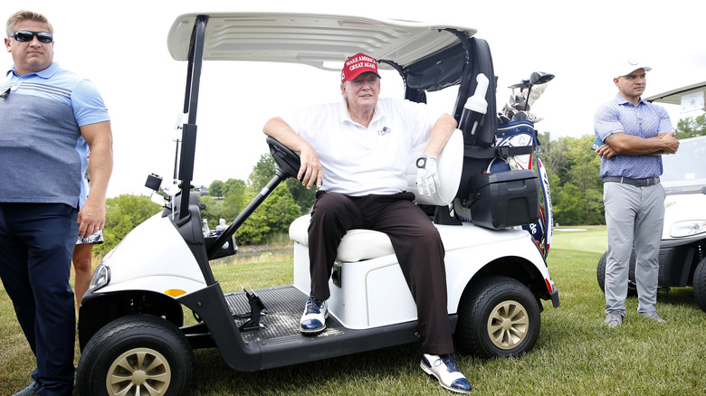 Donald Trump in golf cart