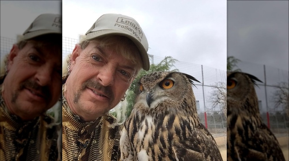 Joe Exotic posing with owl