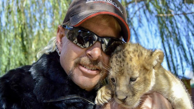 Joe Exotic with a baby tiger