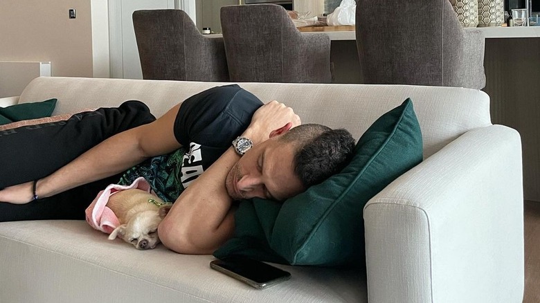 Joe Manganiello and Bubbles sleeping on couch