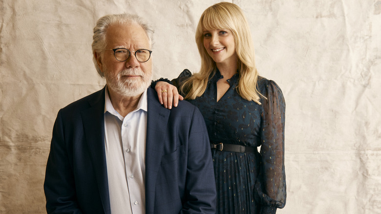 John Larroquette posing with Melissa Rauch