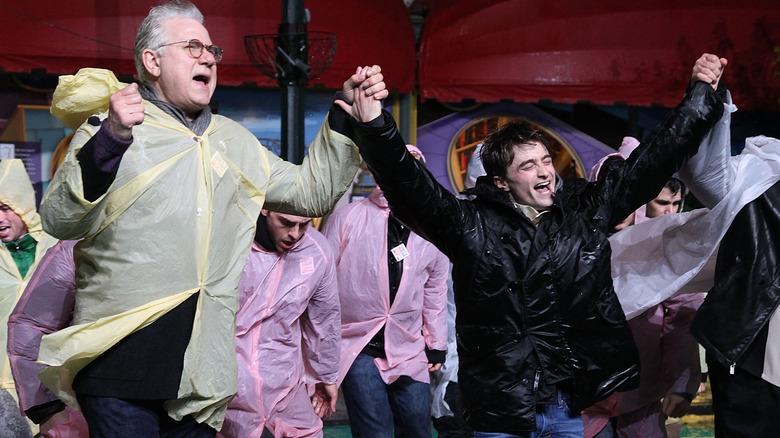 John Larroquette and Daniel Radcliffe in "How to Succeed in Business ..."