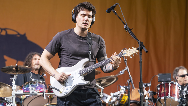 John Mayer playing guitar