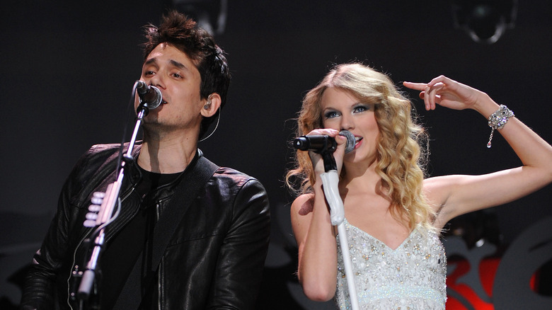 John Mayer and Taylor Swift performing together in 2009