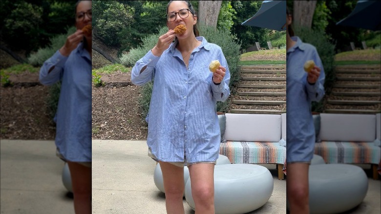 Olivia Munn eating chicken and biscuits