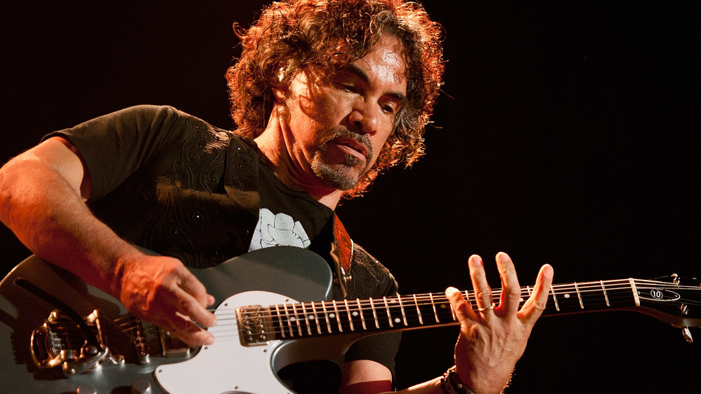 John Oates playing guitar