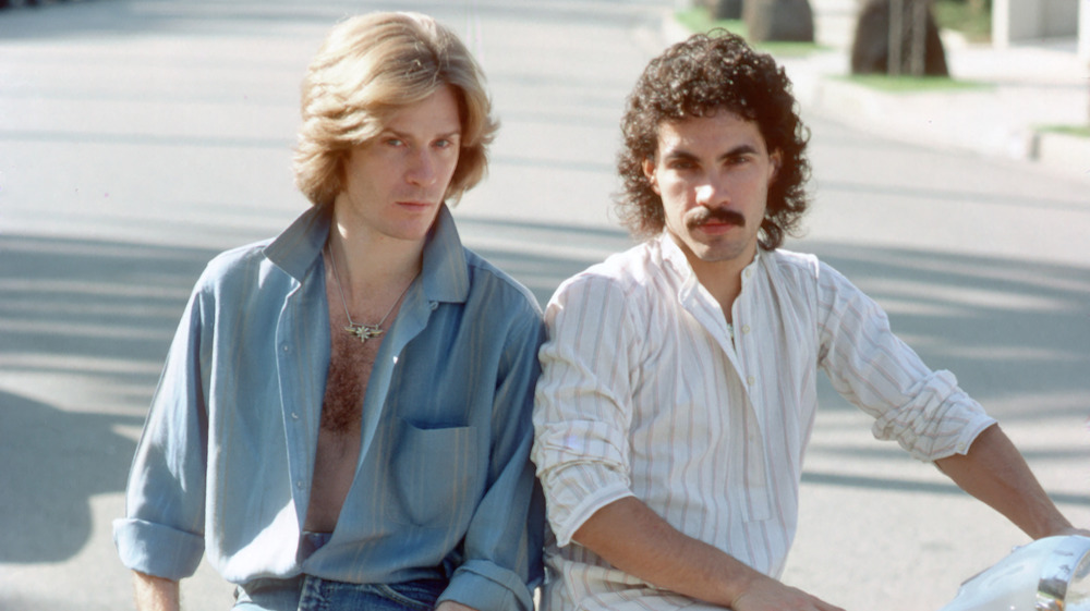 Daryl Hall & John Oates posing for a portrait in the 80s