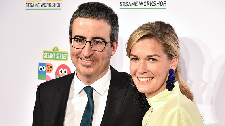 John Oliver and Kate Norley smiling in 2019