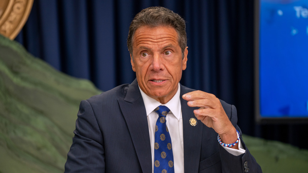 Andrew Cuomo grimacing during a discussion