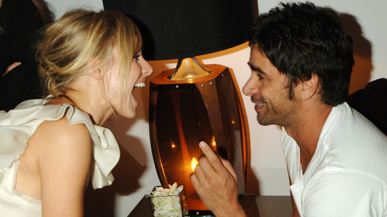 Kristen Bell and John Stamos talking