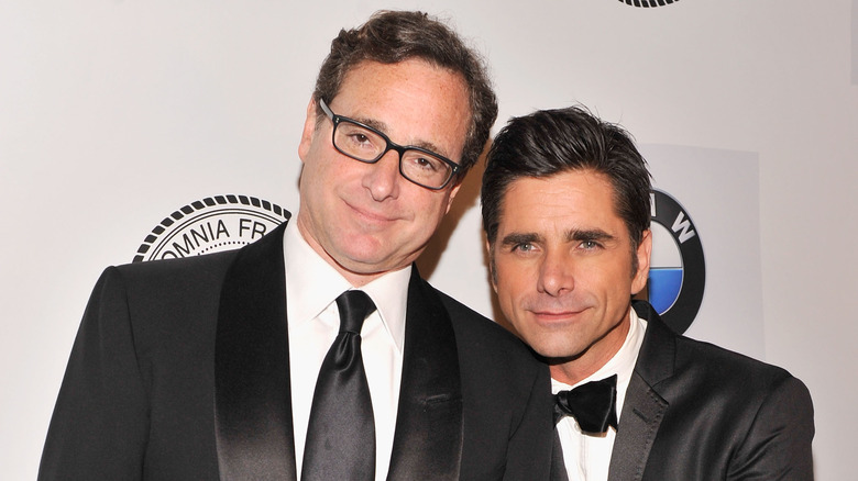 John Stamos and Bob Saget pose 