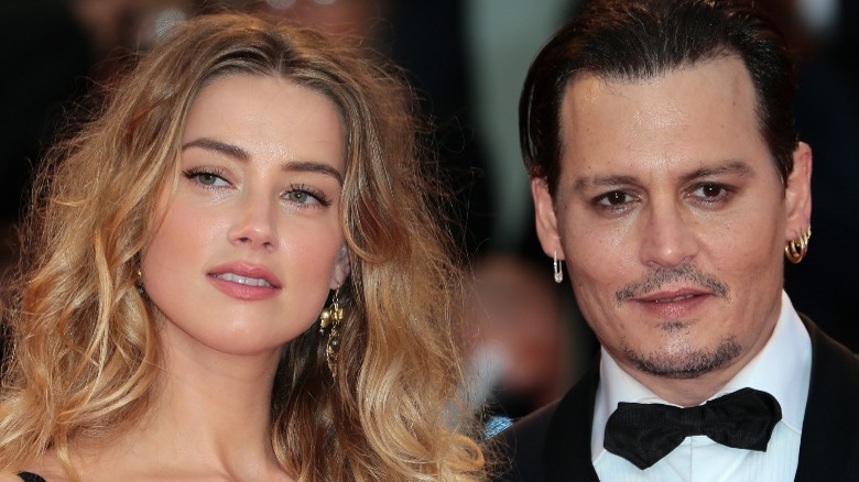 Amber Heard and Johnny Depp posing in 2015