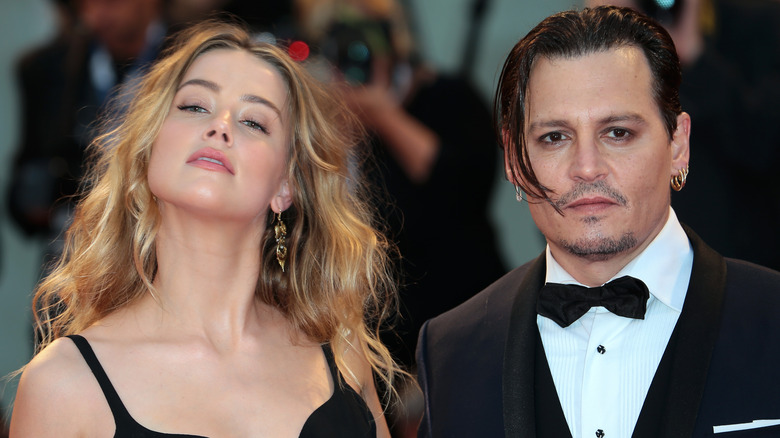 Amber Heard head back Johnny Depp black eyeliner