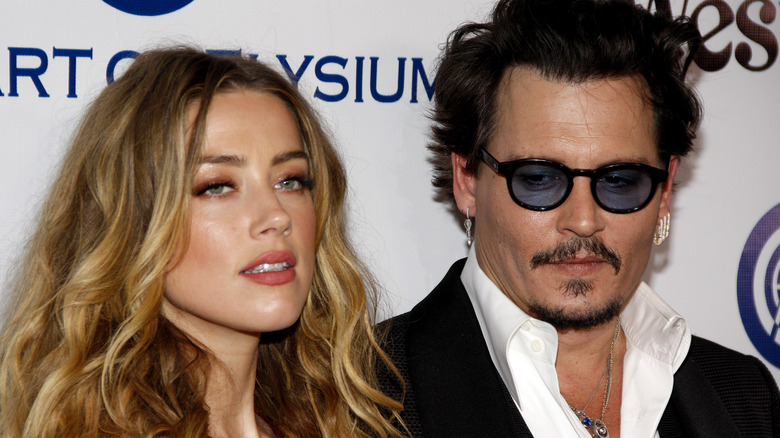 Amber Heard pout Johnny Depp sunglasses goatee