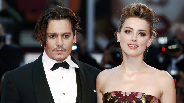 Johnny Depp and Amber Heard pose 