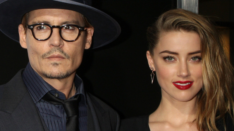 Johnny Depp, Amber Heard at a movie premiere