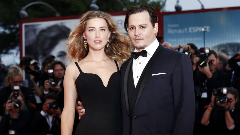 Johnny Depp and Amber Heard at the "Black Mass" premiere