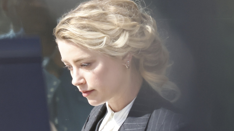 Amber Heard walking outside the courthouse in Fairfax, VA