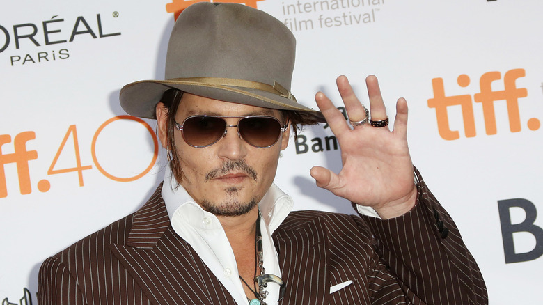 Johnny Depp waving