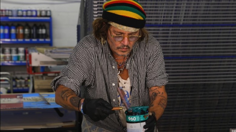 Johnny Depp working in his art studio