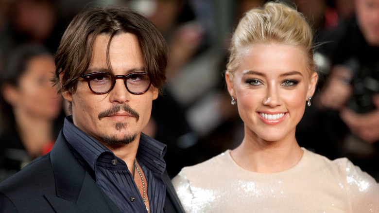 Johnny Depp and Amber Heard posing together