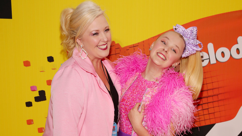 JoJo Siwa and Jessalynn Siwa smiling