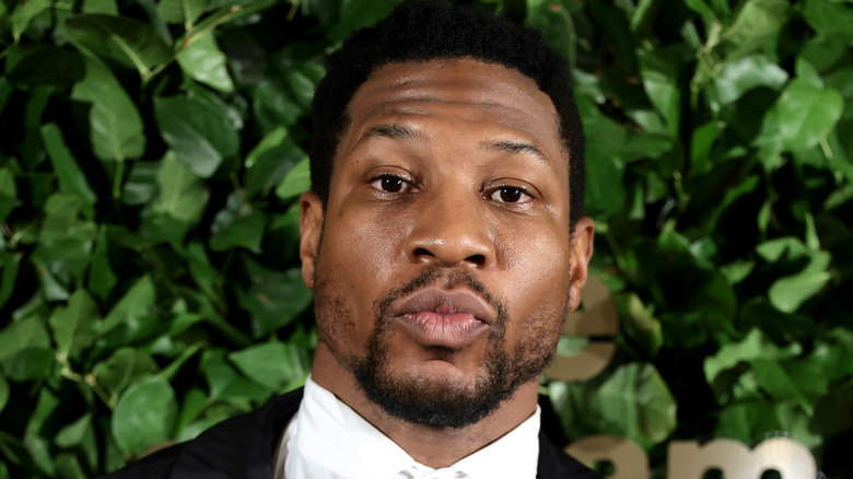 Jonathan Majors posing