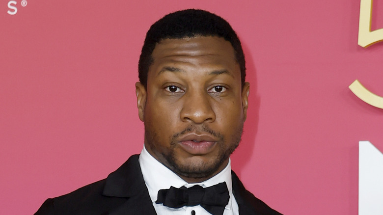 Jonathan Majors posing