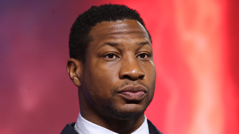 Jonathan Majors looking serious