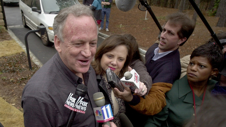 John Ramsey speaking to the press