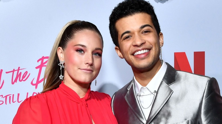 jordan fisher and ellie fisher on a red carpet