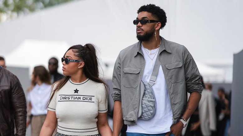 Jordyn Woods and Karl-Anthony Towns hold hands and walk together