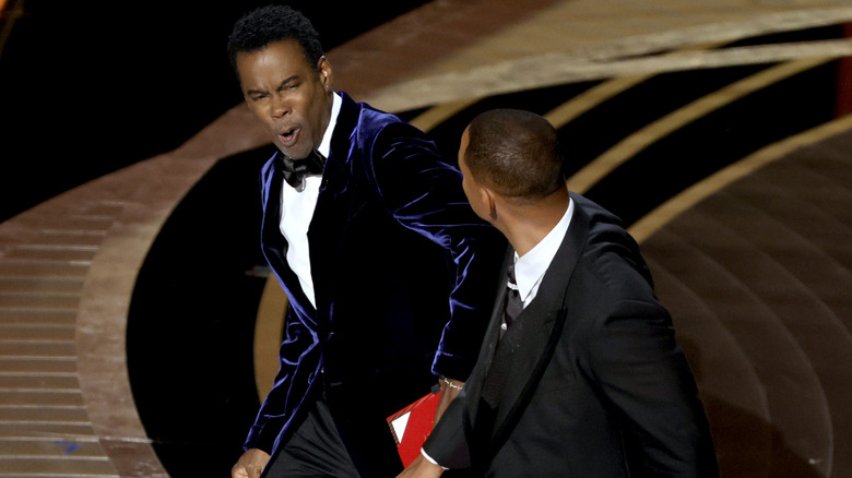 Will Smith appears to slap Chris Rock onstage during the 94th Annual Academy Awards