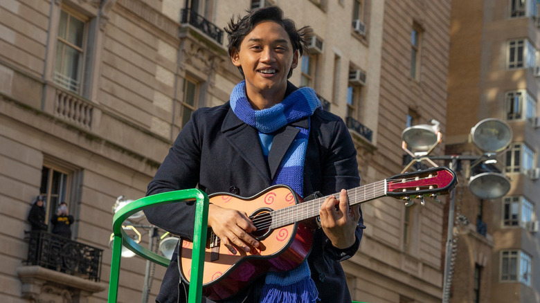 Josh Dela Cruz playing guitar