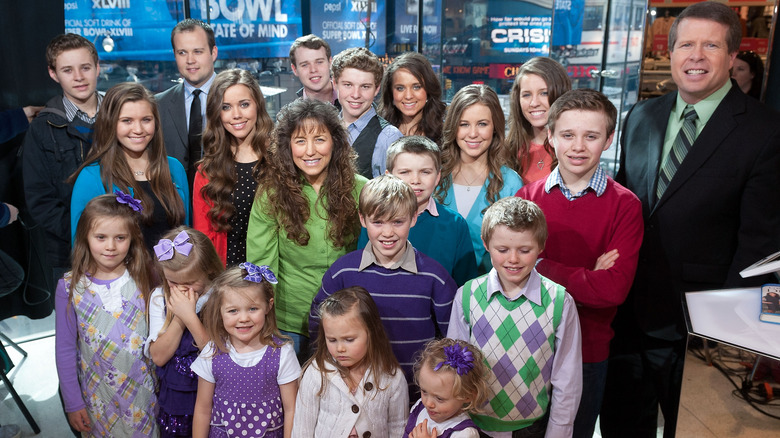 The Duggar family in New York, posing