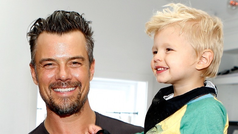 Josh Duhamel holding Axl