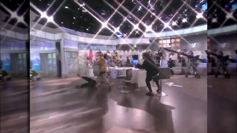 Joy Behar falling on the floor