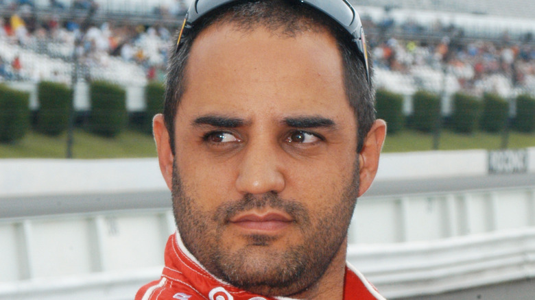 Juan Pablo Montoya reacts after finishing a race