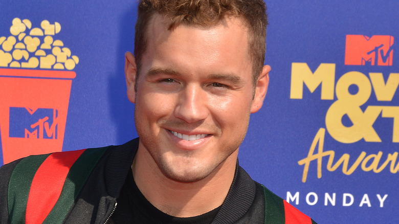 Colton Underwood posing for cameras