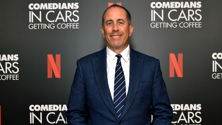 Jerry Seinfeld wearing blue suit