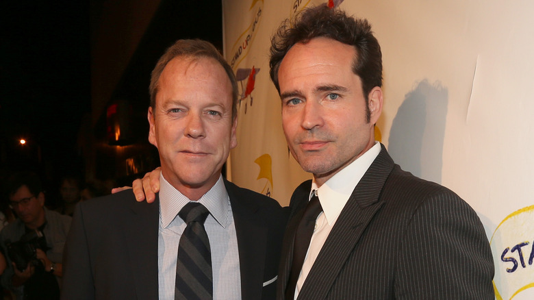 Kiefer Sutherland and Jason Patric pose at an event in 2013