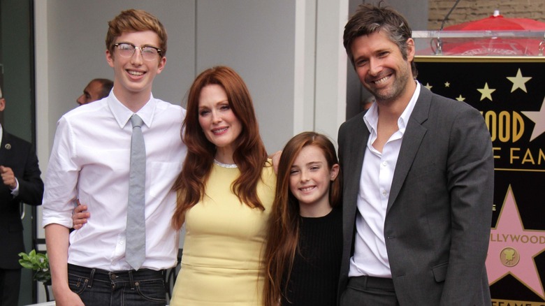 Julianne Moore with her family on The Hollywood Walk of Fame