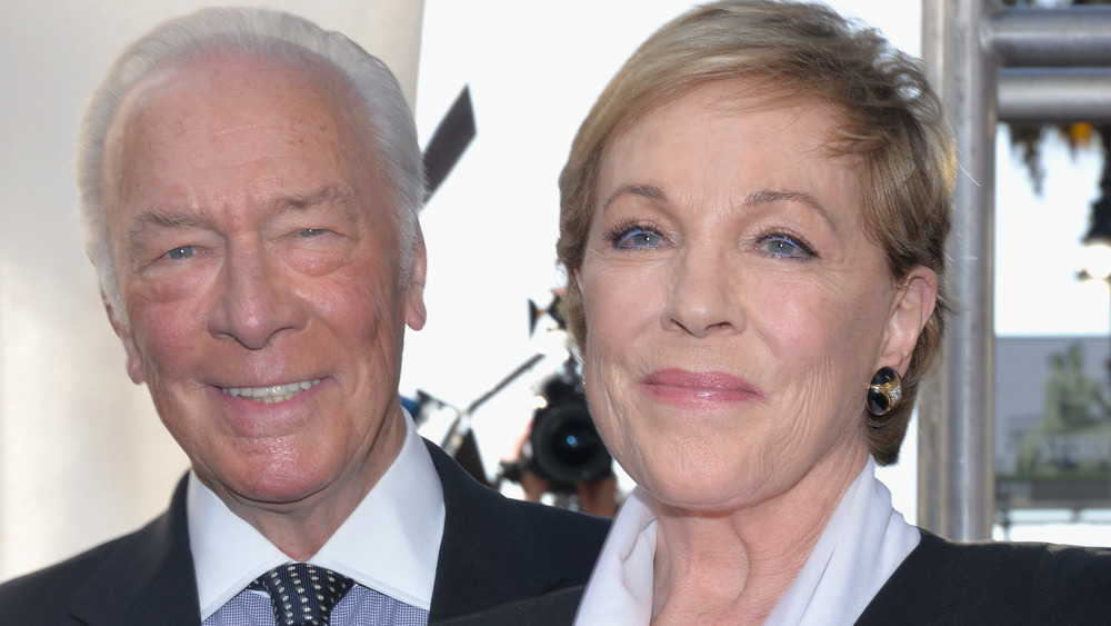 Christopher Plummer smiles alongside Julie Andrews at an event